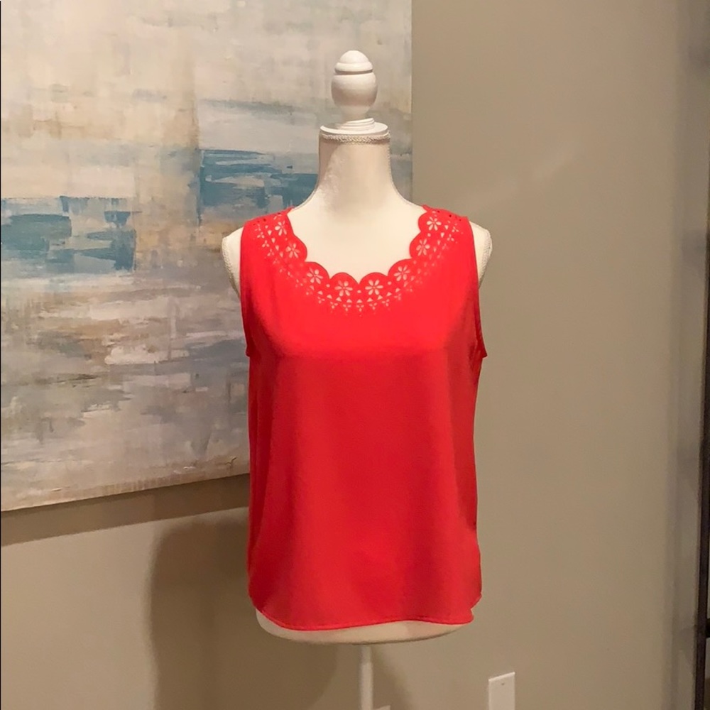 Laser cut neck detail blouse.